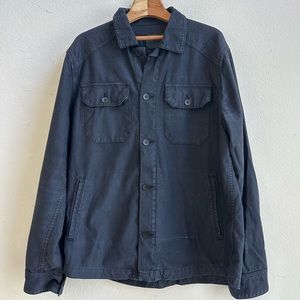 The Elias Shirt Jacket has an oversized fit with long sleeves